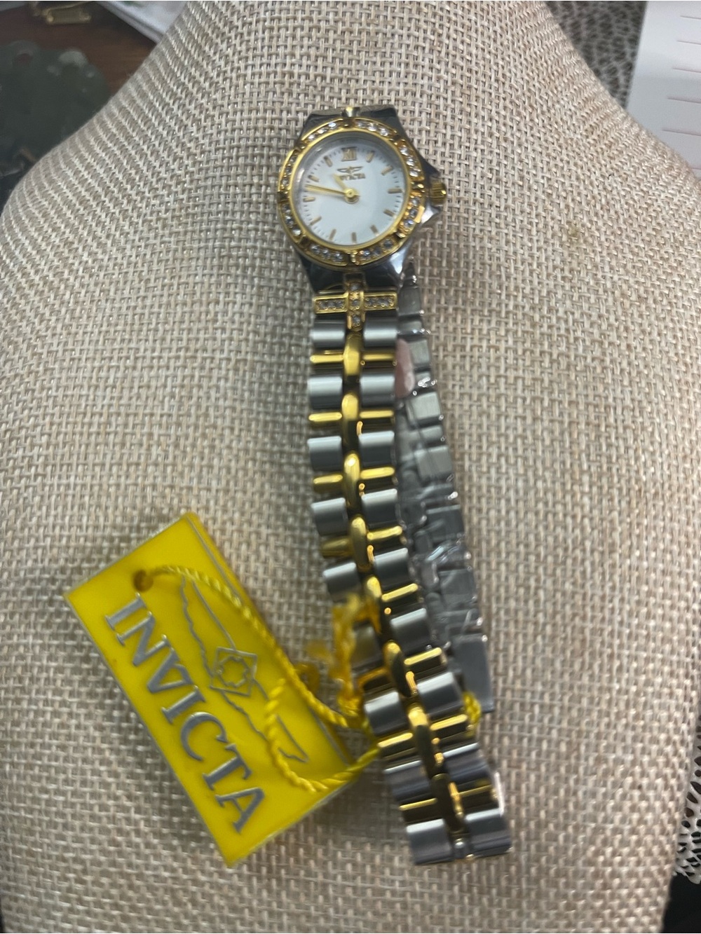 NWT Invicta gold tone/silver lady Watch, needs a battery 8” band